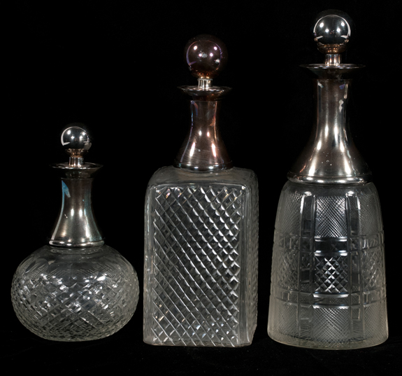 Collection of Six Cut Crystal Decanters with Silver Plated Mounts