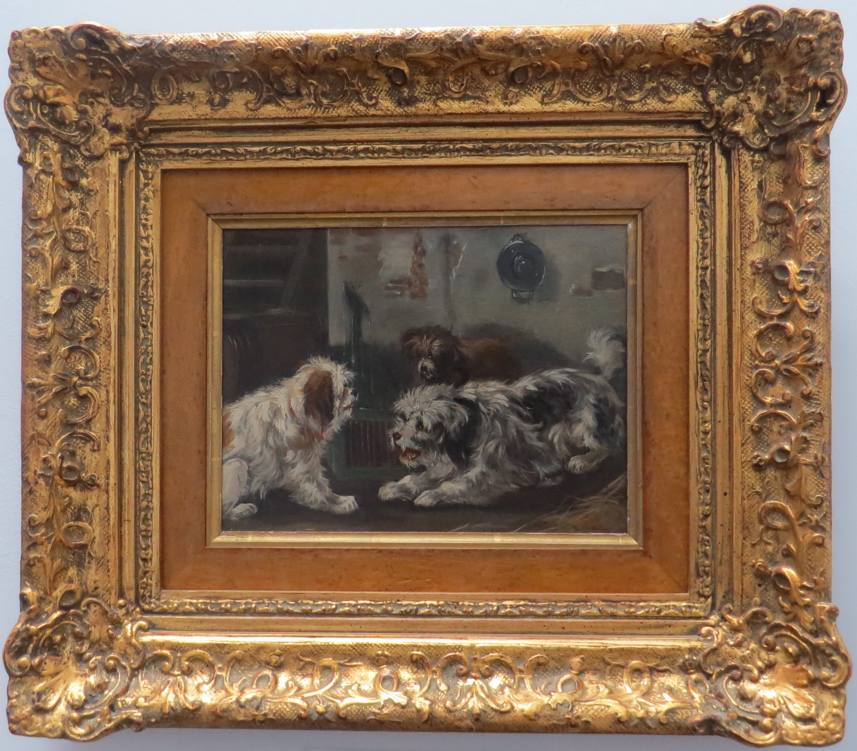 Oil on Panel of Three Dogs Playing, signed R.M.
