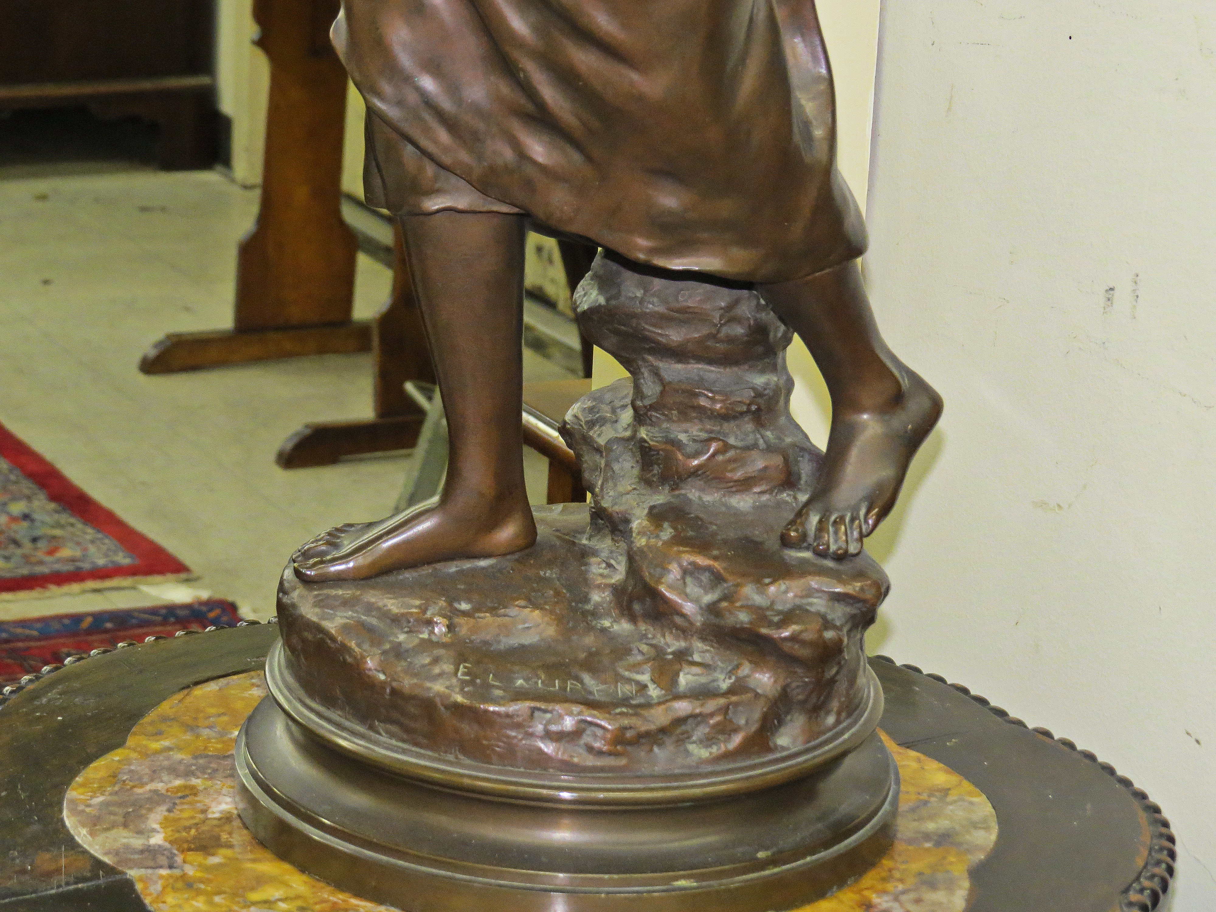 French Bronze Sculpture of a Female Figure with a Basket; Signed E. Laurent (1832-1898)