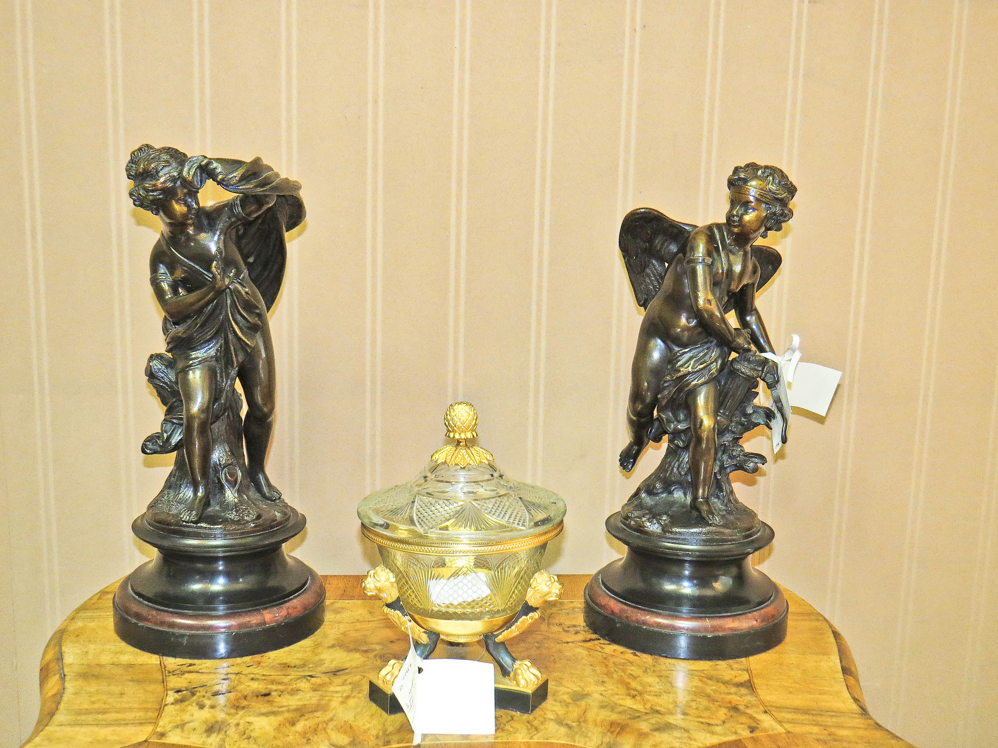 Pair of French Bronze Sculptures of a Male Figure and a Cherub