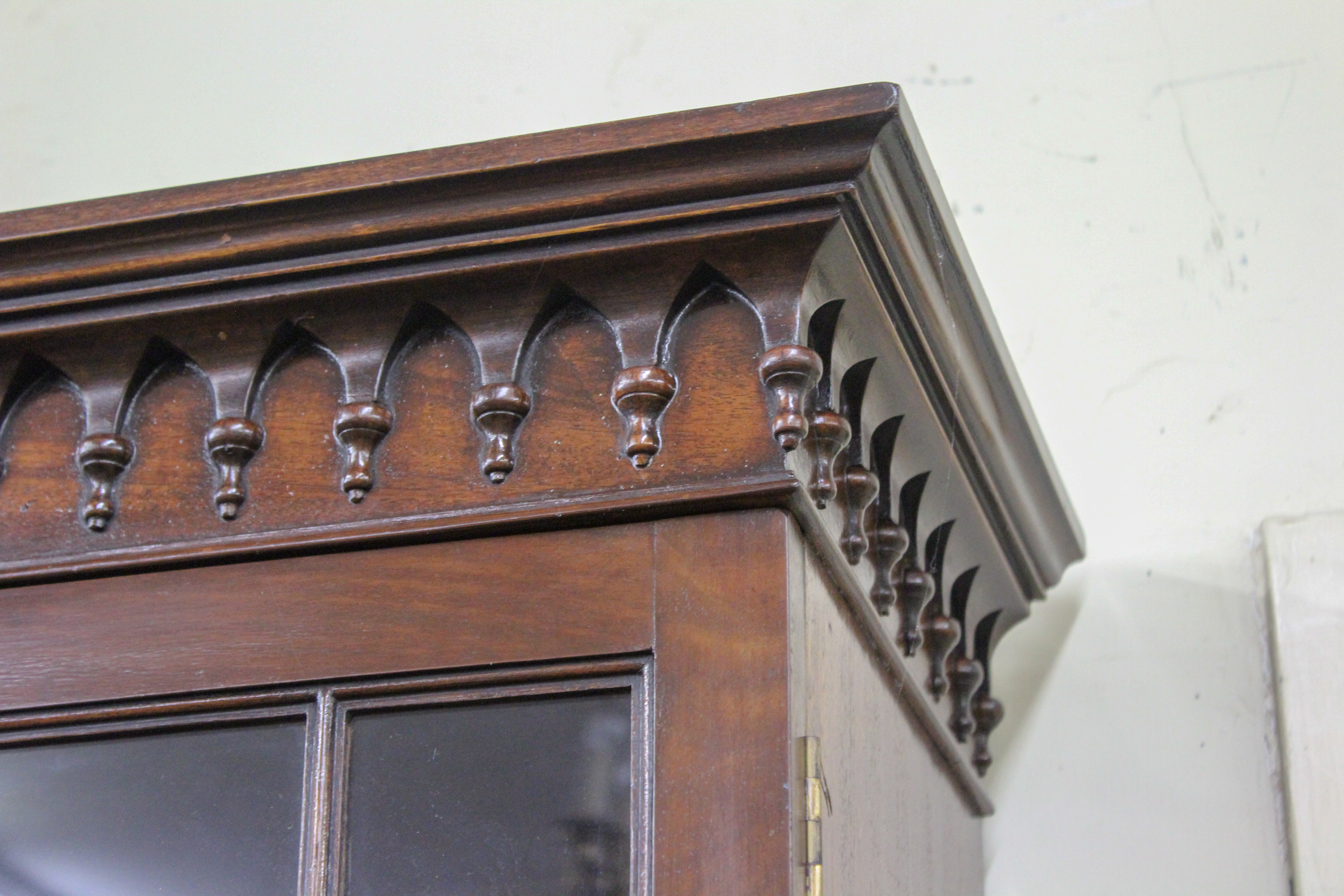 An English Chippendale Mahogany Bureau Bookcase with Tear Drop Crown Molding